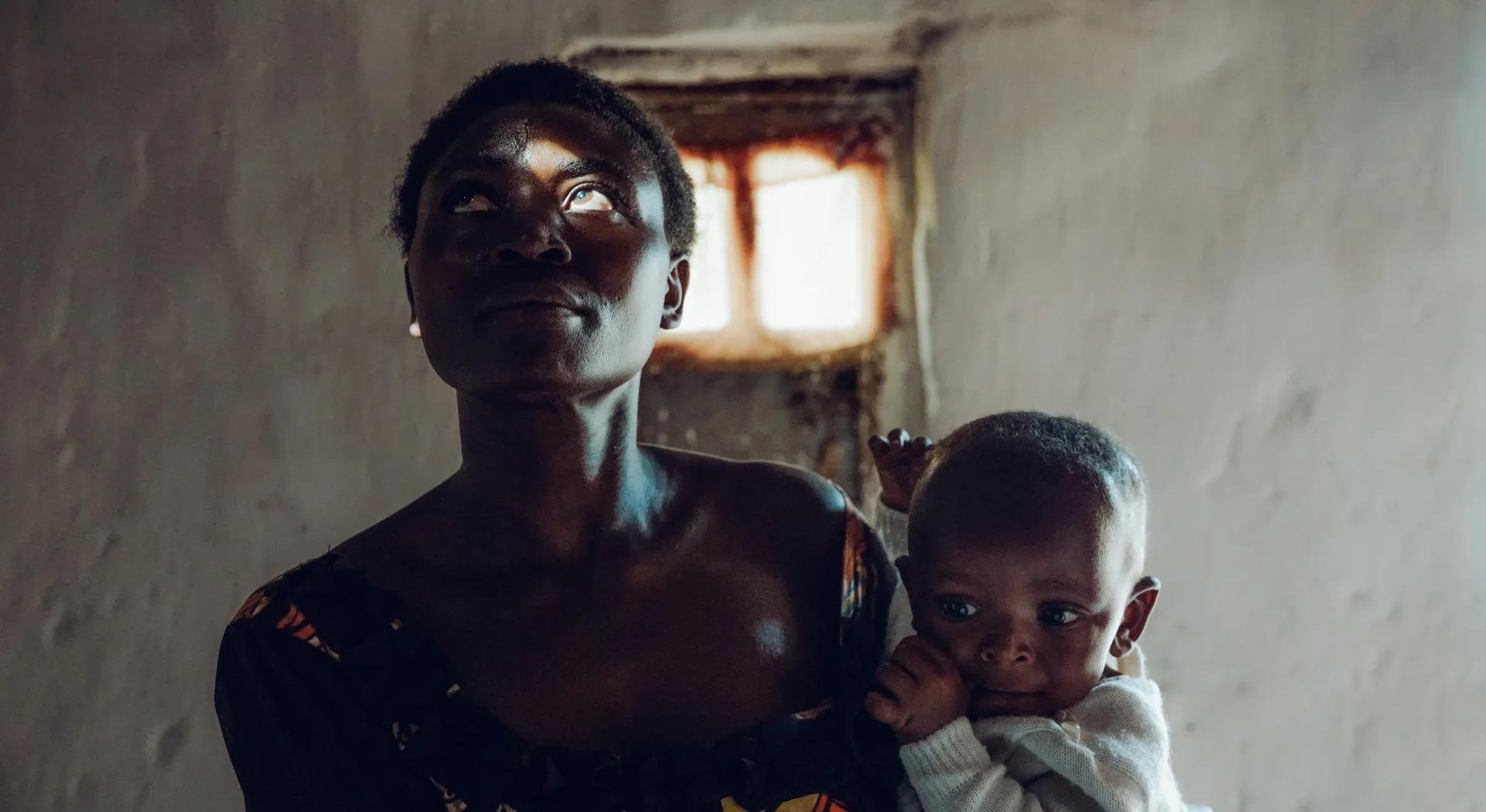 Een vrouw en kind in Congo - ZOA Ondernemersevent