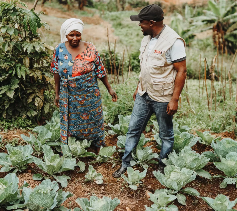 Woman on her field in DR Congo