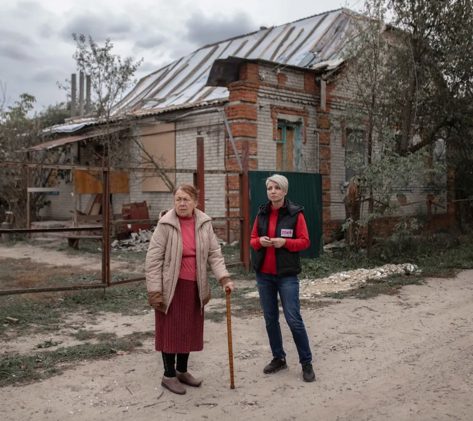 Iryna and a ZOA employee