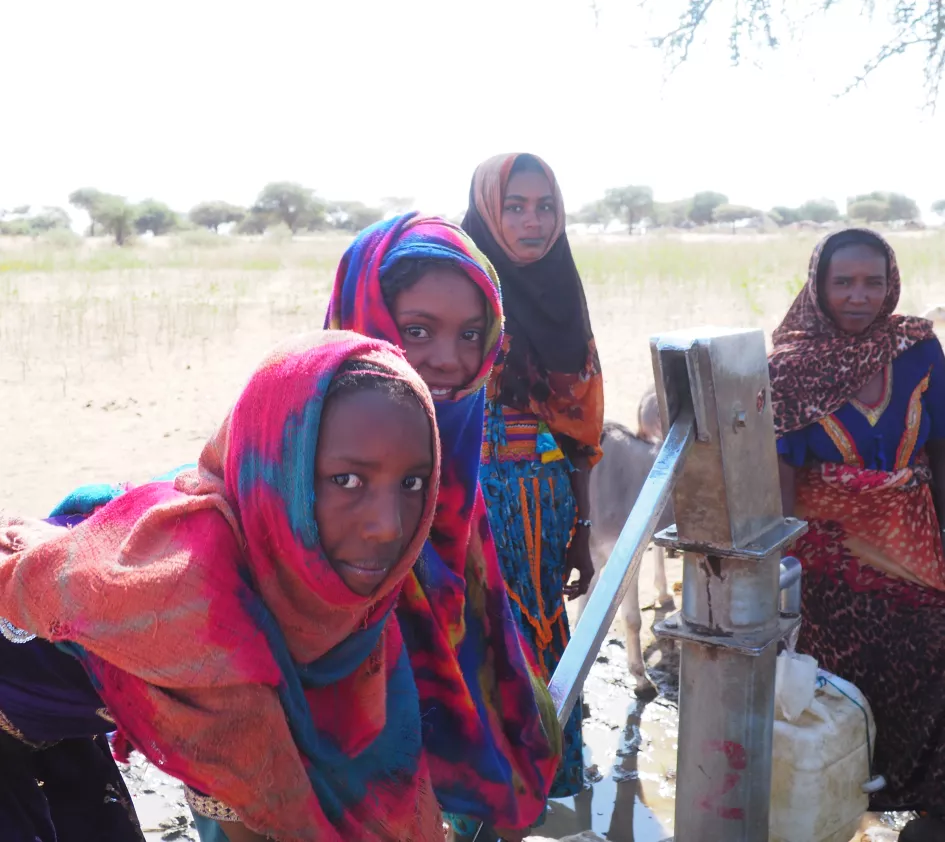 Girls at handpomp South Sudan