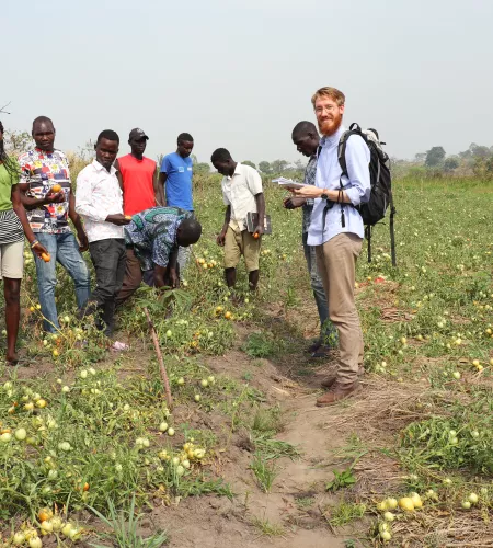 Joppe in the field with Ugandan youth